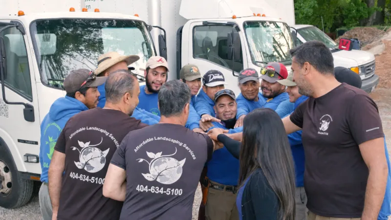 The ALS crew huddled up in front of the trucks before a route
